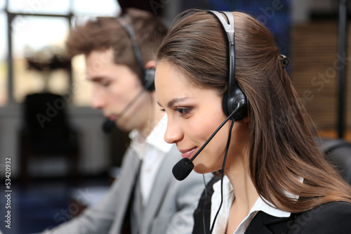 Photo: Call center operators at work. Call center operators at work.