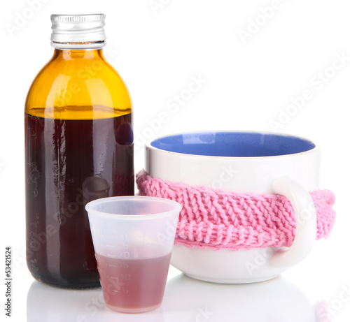 Photo: Cough syrup isolated on white Cough syrup isolated on white