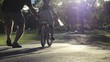 Excited Father Helps Daughter Ride Bike For First Time