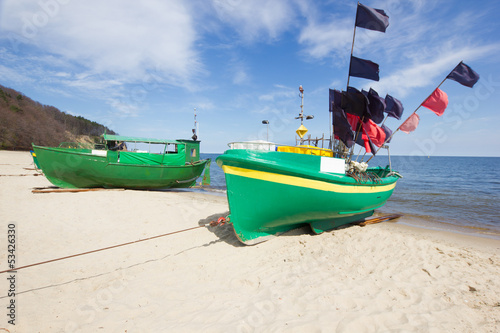 Photo: colorful fisher boats on Baltic beach colorful fisher boats on Baltic beach