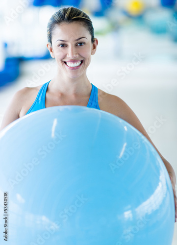 Photo: Gym woman with Pilates ball Gym woman with Pilates ball
