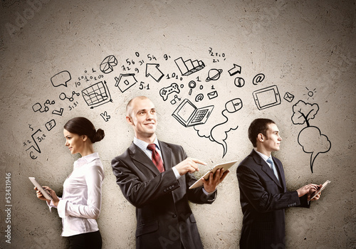 Photo: Three young people in business suits Three young people in business suits