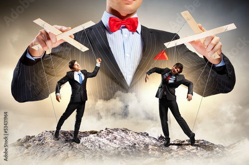Photo: Businessman puppeteer Businessman puppeteer