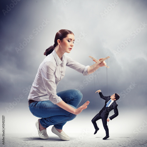Photo: Businesswoman puppeteer Businesswoman puppeteer