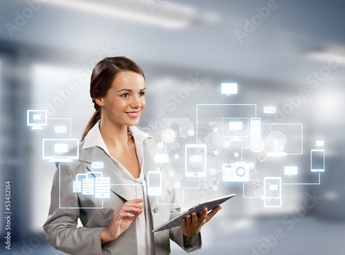 Photo: Businesswoman with tablet pc Businesswoman with tablet pc