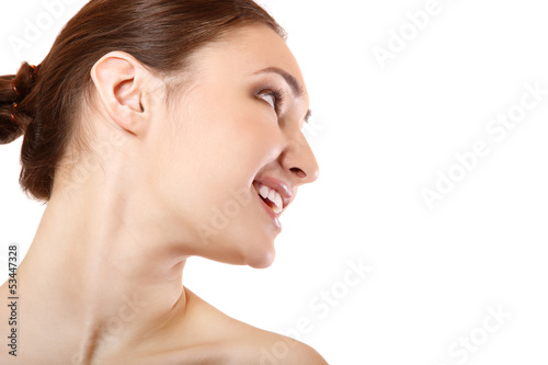 Photo: Beauty portrait of beautiful young woman face in profile Beauty portrait of beautiful young woman face in profile