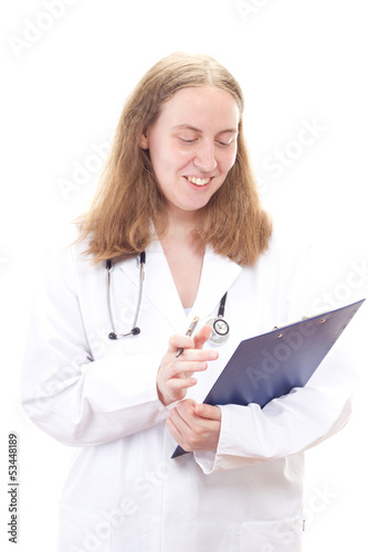 Photo: Happy female doctor reading patients file Happy female doctor reading patients file