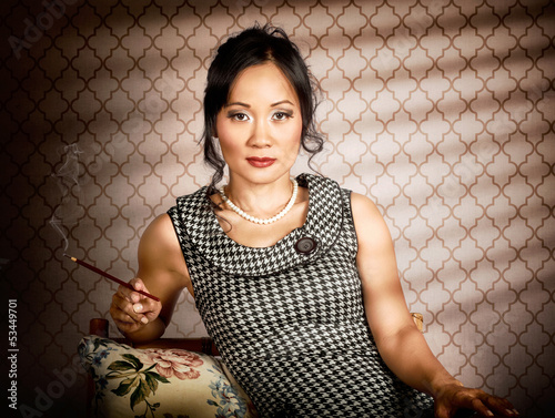 Photo: Stylish vintage asian pin-up lady with cigarette Stylish vintage asian pin-up lady with cigarette