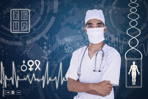 Photo: Thoughtful doctor wearing mask Thoughtful doctor wearing mask