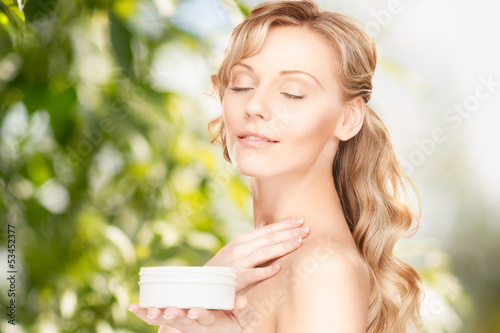 Photo: beautiful woman with moisturizing creme beautiful woman with moisturizing creme