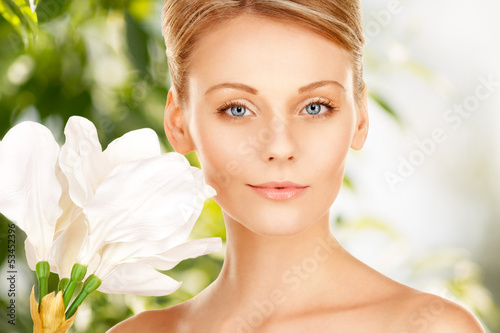 Photo: beautiful woman with madonna lily beautiful woman with madonna lily