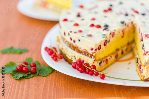 Photo: cake with cream and red currants cake with cream and red currants