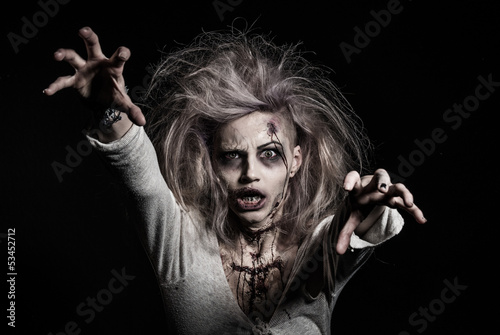 Photo: a scary undead zombie girl a scary undead zombie girl