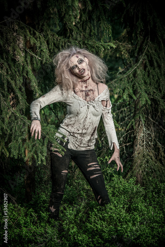 Photo: a scary undead zombie girl a scary undead zombie girl