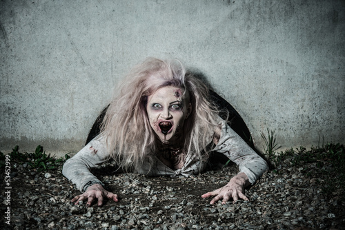 Photo: a scary undead zombie girl a scary undead zombie girl