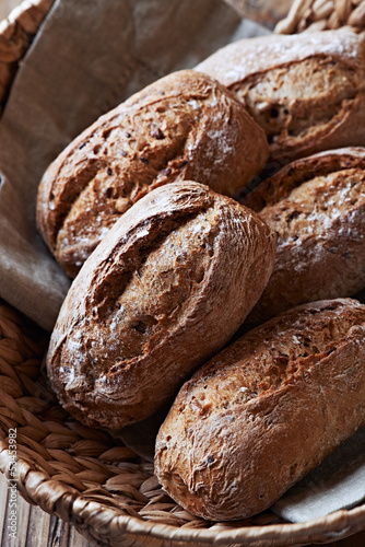 Photo: Wholemeal bread rolls in a basket Wholemeal bread rolls in a basket