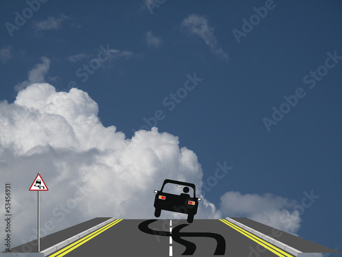 Photo: Car skidding across the road Car skidding across the road