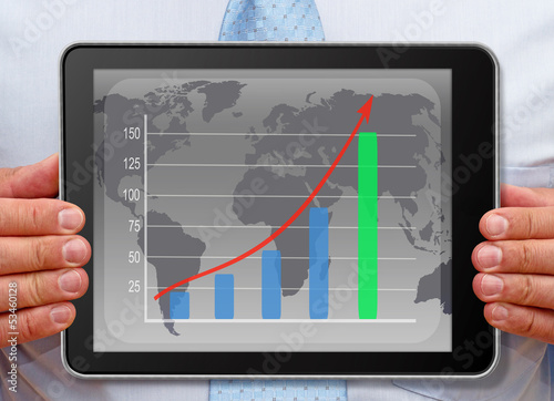 Illustration: Businessman with Chart on Tablet PC Businessman with Chart on Tablet PC