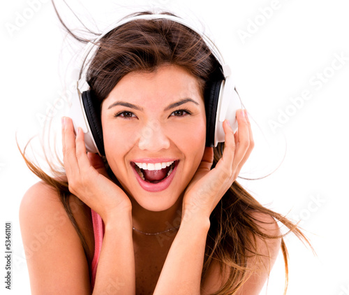 Photo: Happy woman listening to music Happy woman listening to music