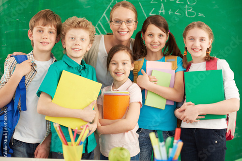 Photo: Teacher and learners Teacher and learners