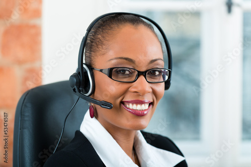 Photo: Young Woman from the customer service Young Woman from the customer service