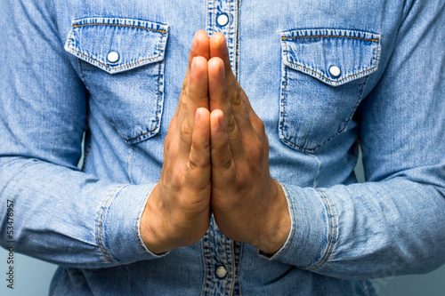 Photo: Blue collar worker praying Blue collar worker praying