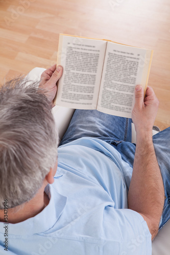 Photo: Mature Man Reading Book Mature Man Reading Book