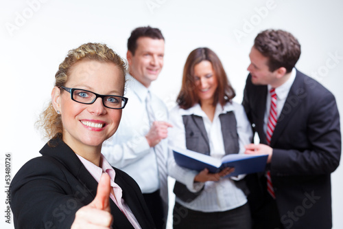 Photo: team leader with motivated staff team leader with motivated staff