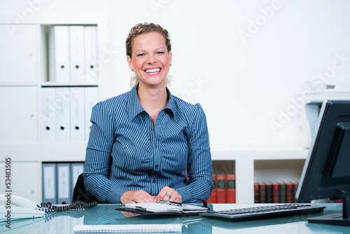 Photo: glad and laughing businesswoman glad and laughing businesswoman
