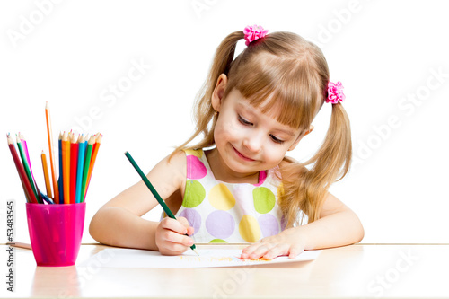 Photo: child girl drawing with colourful pencils child girl drawing with colourful pencils
