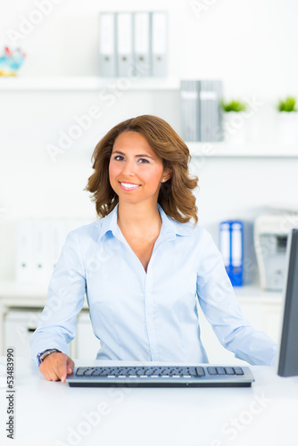 Photo: pretty businesswoman in the office pretty businesswoman in the office