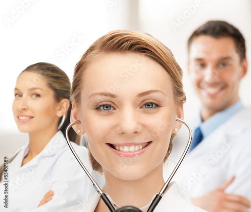 Photo: attractive female doctor with stethoscope attractive female doctor with stethoscope