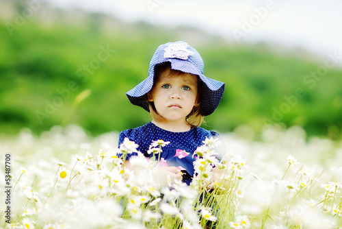 Photo: serious girl in field serious girl in field