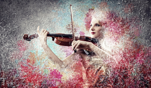 Photo: Gorgeous woman playing violin Gorgeous woman playing violin