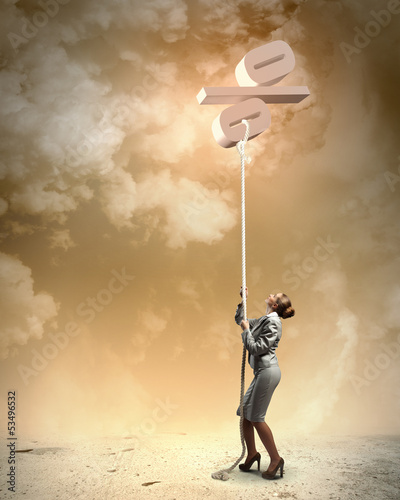 Photo: Image of businesswoman climbing the rope Image of businesswoman climbing the rope