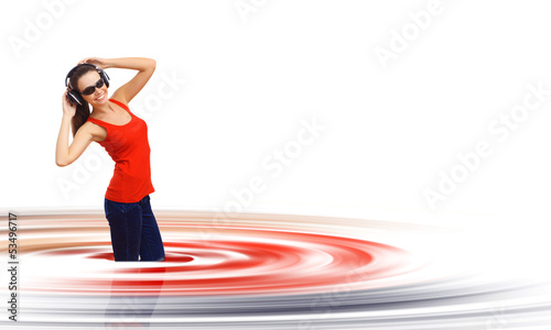 Photo: Happy smiling girl dancing Happy smiling girl dancing