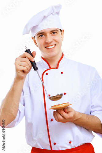 Photo: Young cook preparing food Young cook preparing food