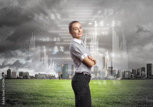 Photo: Business person with digital symbols Business person with digital symbols