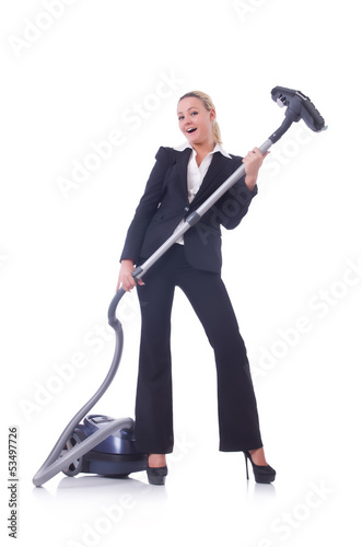 Photo: Businesswoman with vacuum cleaner on white Businesswoman with vacuum cleaner on white