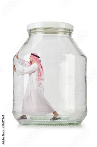 Photo: Arab businessman in glass jar Arab businessman in glass jar