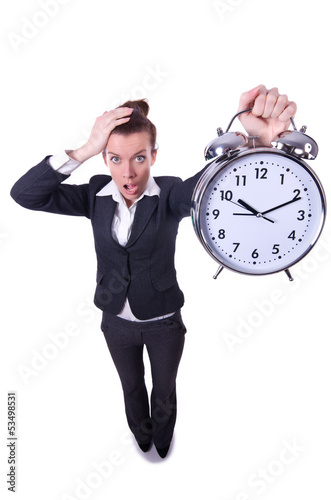 Photo: Funny woman with clock on white Funny woman with clock on white