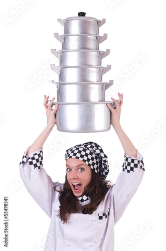 Photo: Cook with stack of pots on white Cook with stack of pots on white