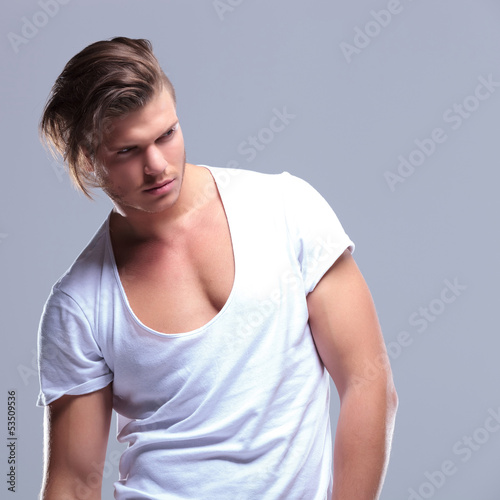 Photo: fashion man looks away from you fashion man looks away from you
