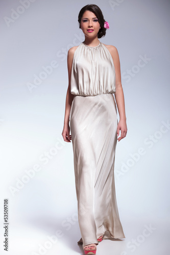 Photo: beauty woman walks towards the camera beauty woman walks towards the camera