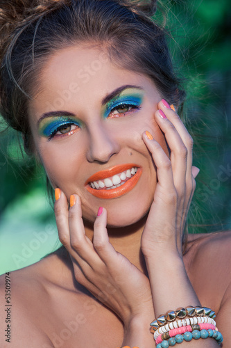 Photo: Beautiful caucasian woman with artistic makeup Beautiful caucasian woman with artistic makeup
