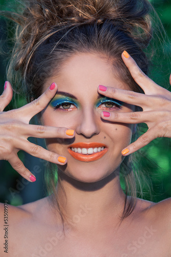 Photo: Beautiful caucasian woman with artistic makeup Beautiful caucasian woman with artistic makeup