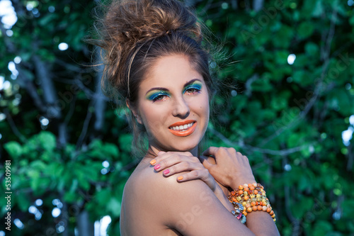 Photo: Beautiful caucasian woman with artistic makeup Beautiful caucasian woman with artistic makeup