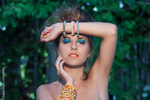 Photo: Beautiful caucasian woman with artistic makeup Beautiful caucasian woman with artistic makeup