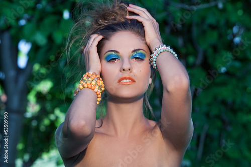 Photo: Beautiful caucasian woman with artistic makeup Beautiful caucasian woman with artistic makeup