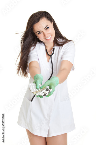 Photo: woman doctor with pills in hand. Female doctor holding many pil woman doctor with pills in hand. Female doctor holding many pil